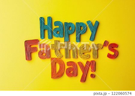 Brightly colored yarn letters spell out Happy Fathers Day against a vivid yellow background, creating a festive and cheerful greeting perfect for celebrating fathers and father figures. 122060574