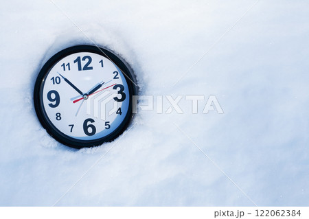 Clock In Snow 122062384