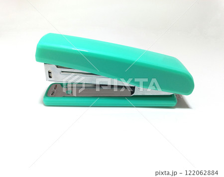 Stapler on White Background.  A stapler photographe against a clean white background. This high-quality image is perfect for office supplies, workplace concepts, and organizational themes. It's ideal  122062884