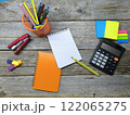 Office desk with various office supplies 122065275