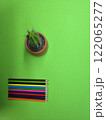 Pencils on a colored piece of paper. 122065277