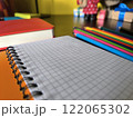 office supplies on a wooden work table. 122065302