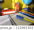 office objects on the desktop, against the background of the globe 122065303