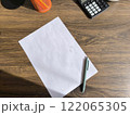 cozy home office desk with a white sheet of paper and plants. High quality photos 122065305