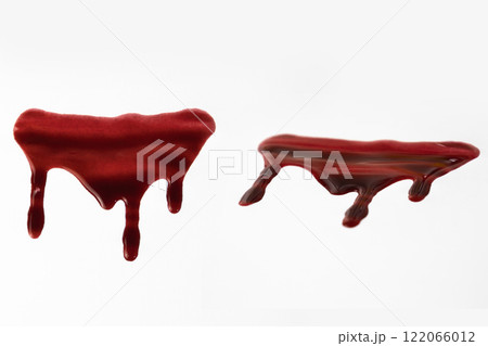 A two angles of blood spatter. A blood flowing down. Bloody pattern. Concepts of blood can be used in design 122066012