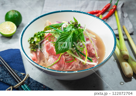 Vietnamese delicacy beef pho, with lots of spices and basil 122072704