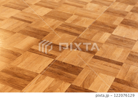 Vintage used parquet made of oak wood planks with squares 122076129