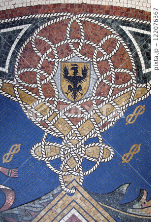 ITALY, MILAN - SEPTEMBER 27, 2014 - Floor mosaic in galleria Vittorio Emanuele II ITALY, MILAN - SEPTEMBER 27, 2014 - Floor mosaic in galleria Vittorio Emanuele II 122076367