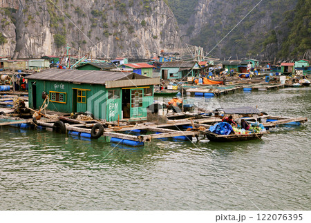 Floating village in Ha Long bay Floating village in Ha Long bay 122076395