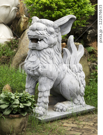 Chinese lion at the entrance of a temple 122076635