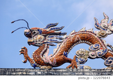 Dragon on a temple roof Dragon on a temple roof 122076643