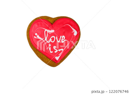 Heart shaped gingerbread cookie isolated on white background Heart shaped gingerbread cookie isolated on white background 122076746