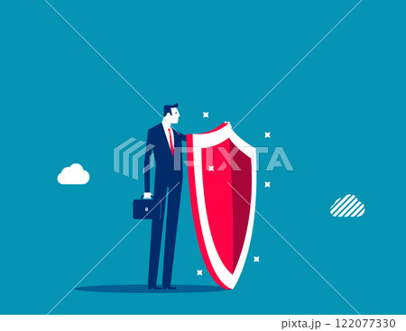 Protect. Businessman have a shield protecting money 122077330