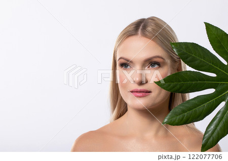 Radiant Beauty Enhanced with Chic Tropical Leaf Accents for a Fresh Aesthetic Appeal Radiant Beauty Enhanced with Chic Tropical Leaf Accents for a Fresh Aesthetic Appeal 122077706