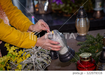 Lighting a Memorial Candle in Remembrance of Loved Ones Who Have Passed Away, Honor Their Legacy Lighting a Memorial Candle in Remembrance of Loved Ones Who Have Passed Away, Honor Their Legacy 122078316