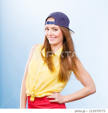 Pretty teenage girl in fashionable clothes. 122079773