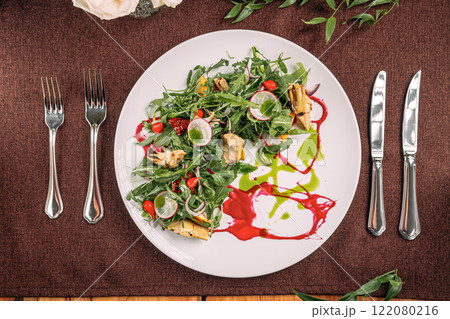 Portion of gourmet fresh salad with artichokes 122080216