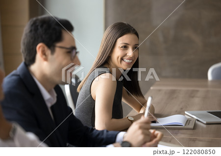 Happy diverse businesspeople take part in group meeting 122080850