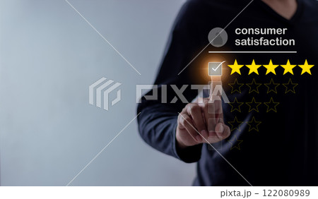 Young Man hand touching five star to review and give 5 stars with very good results Young Man hand touching five star to review and give 5 stars with very good results 122080989