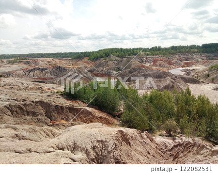 Quarry for the extraction of multi-colored clay in the Ural Mountains Quarry for the extraction of multi-colored clay in the Ural Mountains 122082531