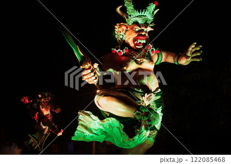 Traditional demon ogoh-ogoh at ritual parade of terrible monsters - Ngrupuk, which is held in evening of Nyepi - Balinese New Year before silence day. Arts and culture of Bali island people. 122085468