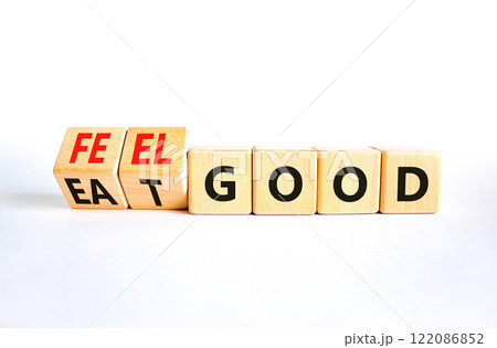 Eat and feel good symbol. Concept words Eat good Feel good on wooden cubes. Beautiful white table white background. Healthy lifestyle eat and feel good concept. Copy space. 122086852