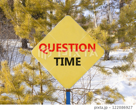 Question time symbol. Concept words Question time on beautiful yellow road sign. Beautiful winter forest background. Business and question time concept. Copy space. 122086927