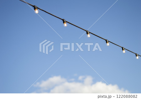 Street lamps against the sky Street lamps against the sky 122088082