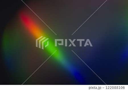 Multicolored defocused lights on a dark background. Abstract background Multicolored defocused lights on a dark background. Abstract background 122088106