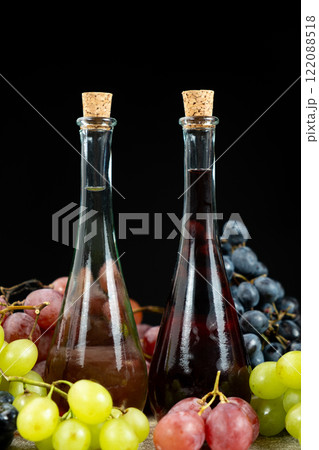 White Wine Vinegar and Red Wine Vinegar in Vinegar Bowls. 122088518