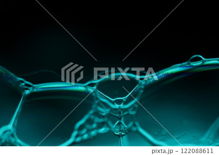 Silver liquid connections, bubble in macro, movement of liquid in a bubble, abstract background 122088611