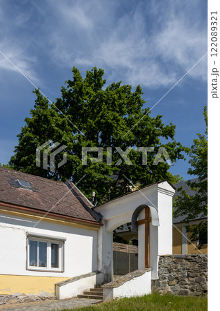 Entrance to the park with a church, Zabreh, Czechia 122089321
