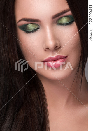 Portrait of young woman with beautiful makeup 122090841