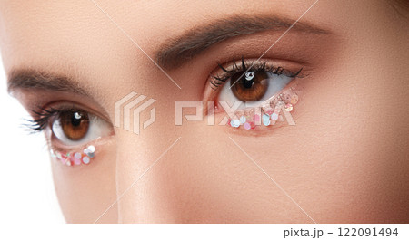 Closeup of female eyes with artistic makeup Closeup of female eyes with artistic makeup 122091494