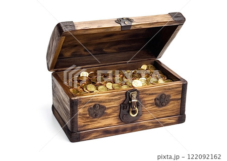 Open wooden treasure chest overflowing with gold coins 122092162