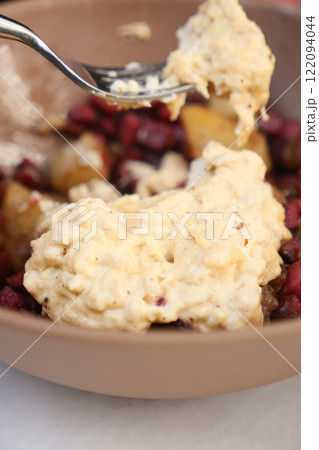 A Delicious and Creamy Dessert Featuring Fresh Fruits and Tasty Toppings A Delicious and Creamy Dessert Featuring Fresh Fruits and Tasty Toppings 122094044