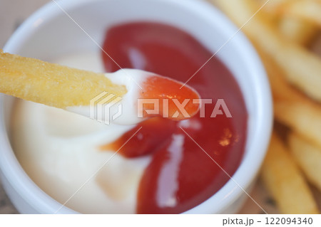 Fries served with Ketchup and a Creamy Dip are beautifully in Focus Fries served with Ketchup and a Creamy Dip are beautifully in Focus 122094340
