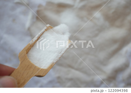 Baking soda on a shirt stain by ink Baking soda on a shirt stain by ink 122094398