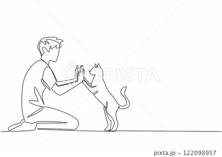 Single one line drawing a man in casual clothes sitting on the floor giving a high five to a cat. Very familiar with beloved pets. National High Five Day. Continuous line design graphic illustration 122098957