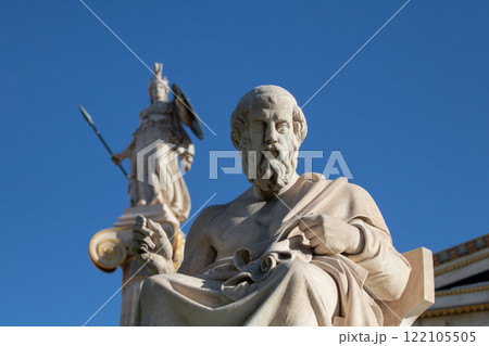 Marble statue of Greek philosopher Plato. Goddess Athena on background. Marble statue of Greek philosopher Plato. Goddess Athena on background. 122105505