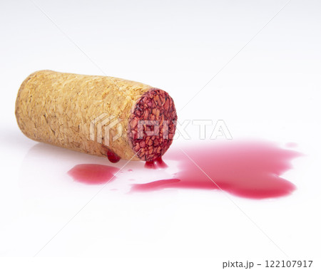 Wine cork with red color track vintage winery isolated on the white background Wine cork with red color track vintage winery isolated on the white background 122107917
