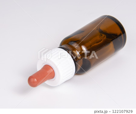 Pipette bottle mockup medical brown glass on the white backround Pipette bottle mockup medical brown glass on the white backround 122107929