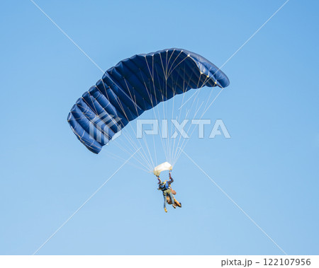 Skydiver activity sport jump on the blue sky background 122107956