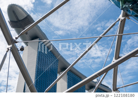 Marina Bay Sands, a landmark of Singapore through Helix Bridge, or The Helix, a pedestrian bridge. 122108180