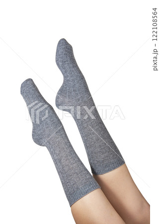 Gray warm high socks on woman legs elegant isolated on the white background 122108564