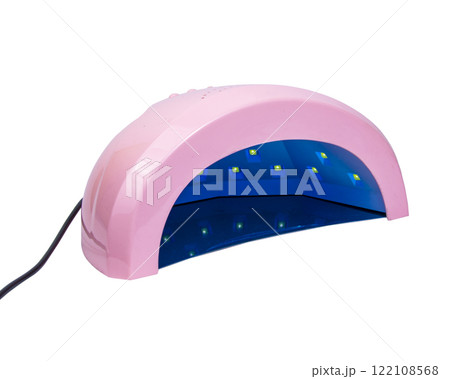 Pink uv led nail lamp isolated on the white background 122108568