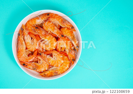 Sea shrimp fresh on blue background Sea shrimp fresh on blue background 122108659