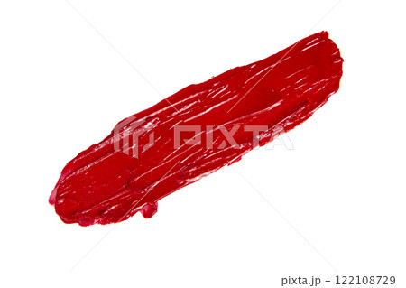 Red creamy texture lipstick track isolated on the white background 122108729