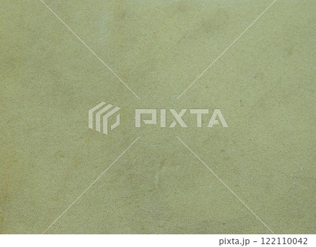 pale grey-yellow background full frame with vague unexpressed uniform texture, fabric or paper blank backdrop of faded tone 122110042