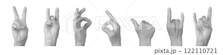 Elderly female hand showing gestures like peace, victory, and rock horn, thumb up, and clenched fist 122110721